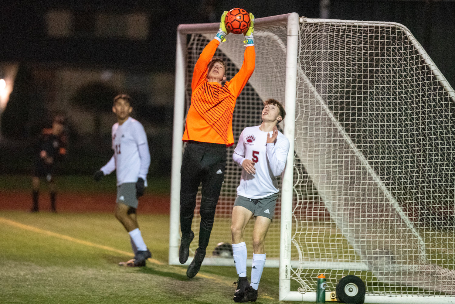 W.F. West keeper Hayden Sciera makes a leaping save against Centralia in regulation on April 22.